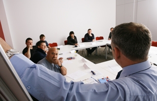 Trainer doing a training course with a group